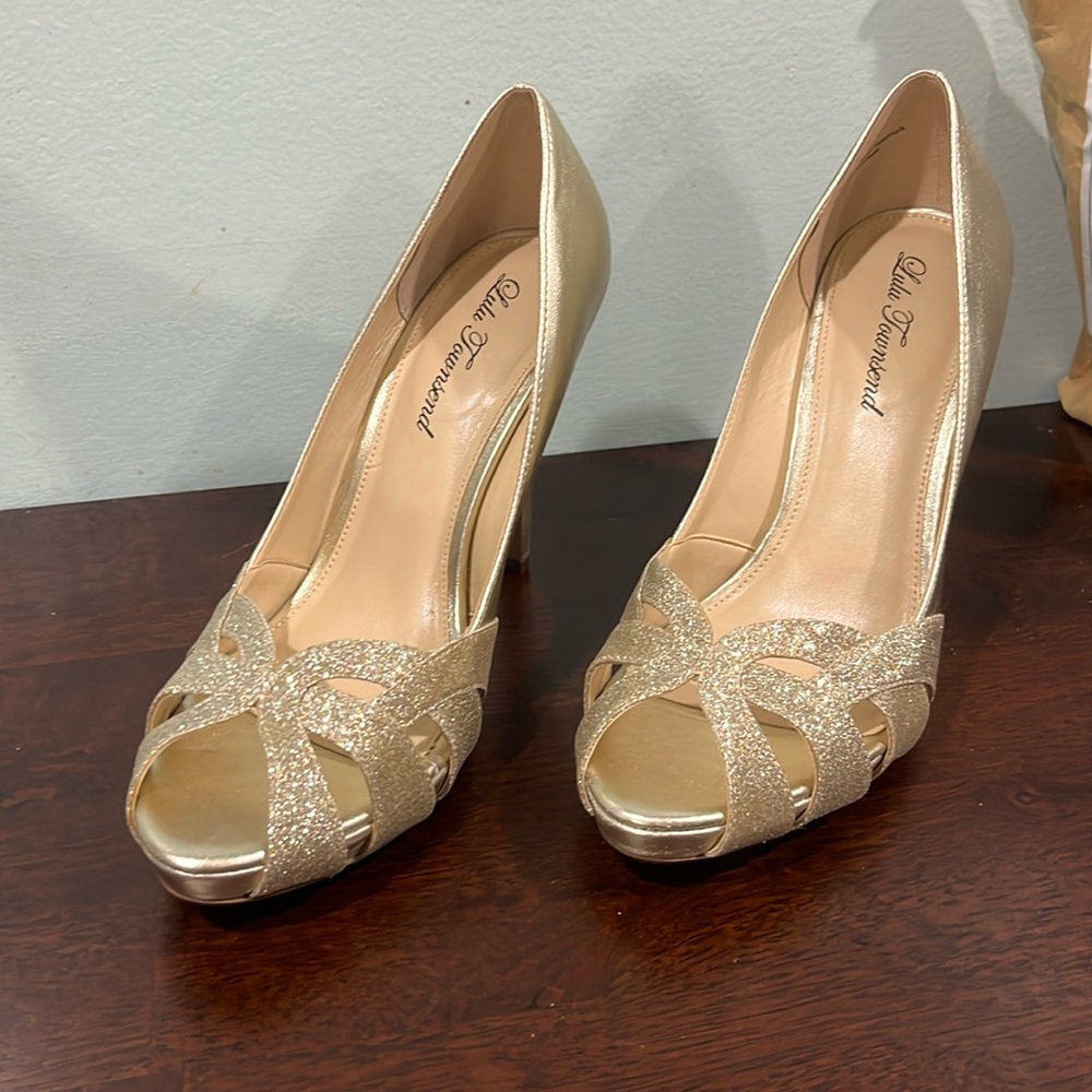 Never worn gold pumps!